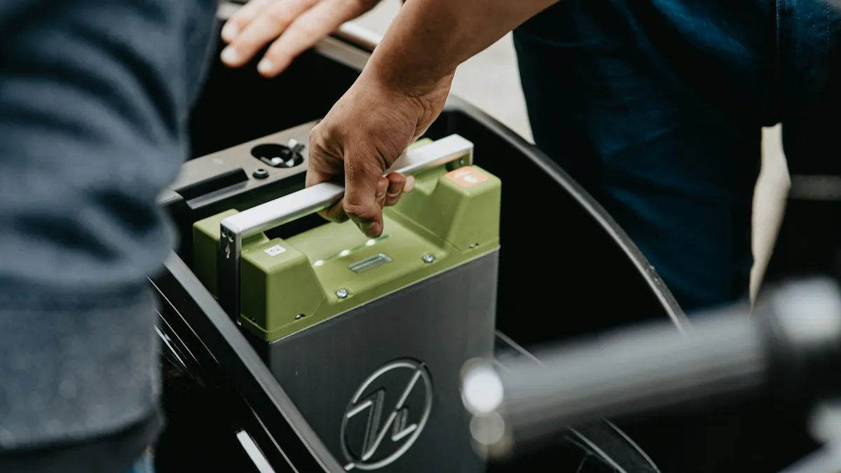 Two-wheeler battery being fitted into a scooter