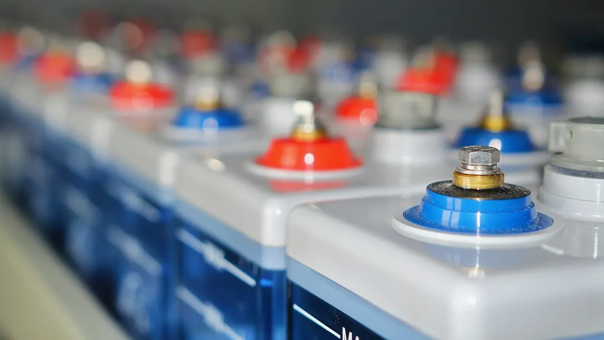 Rows of heavy-duty battery cells with red and blue terminals